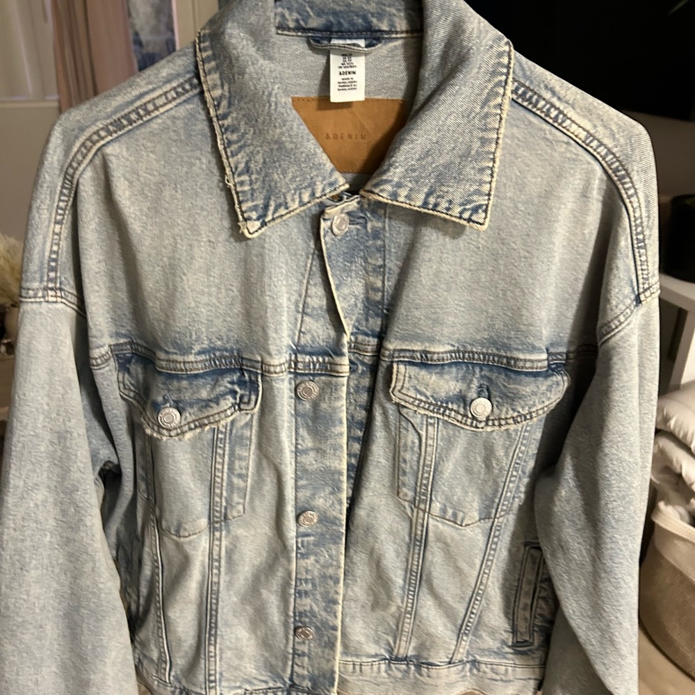 Light blue Jean jacket XS but fits like a Medium. Brand new never worn.